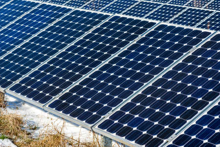 Winter snow landscape of solar panel, photovoltaic, alternative electricity source - selective...