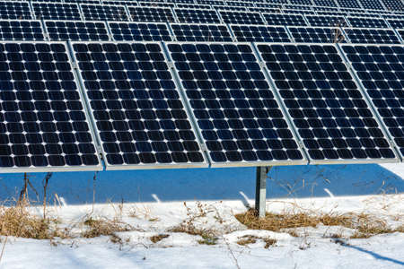 Solar station in winter. Solar panel, photovoltaic. Alternative electricity source. Concept of...