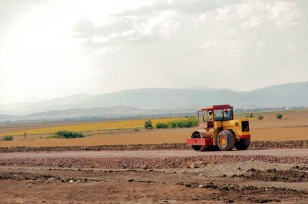 Support activities for the construction of a highway  Road under construction のeditorial素材