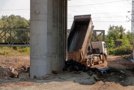 Support activities for the construction of a highway  Road under construction のeditorial素材