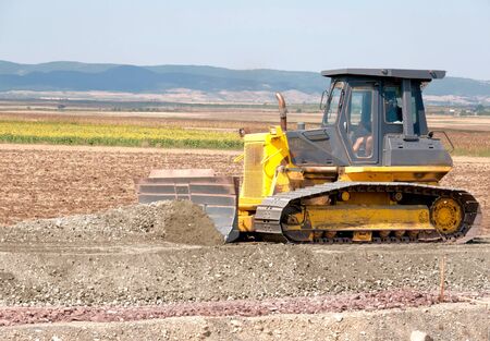 Support activities for the construction of a highway  Road under construction のeditorial素材