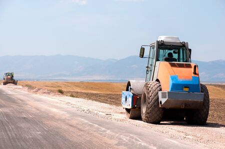 Support activities for the construction of a highway  Road under construction のeditorial素材