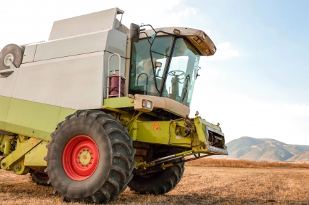 Agricultural activities, modern farm equipment in fieldの写真素材