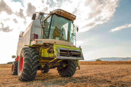 Agricultural activities, modern farm equipment in fieldのeditorial素材