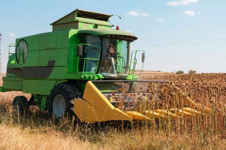 Agricultural activities, modern farm equipment in fieldのeditorial素材
