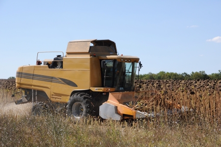 Agricultural activities, modern farm equipment in fieldのeditorial素材