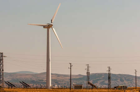 Wind generator working on the field.の写真素材