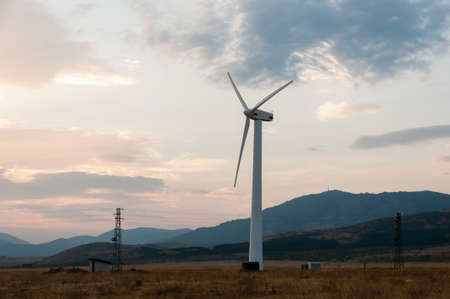 Wind generator working on the field.の写真素材