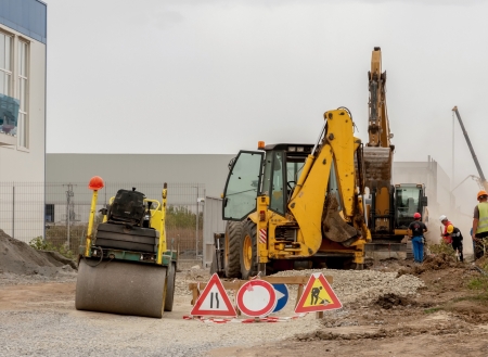 Support activities for the construction of roads and highways. Road under construction.のeditorial素材