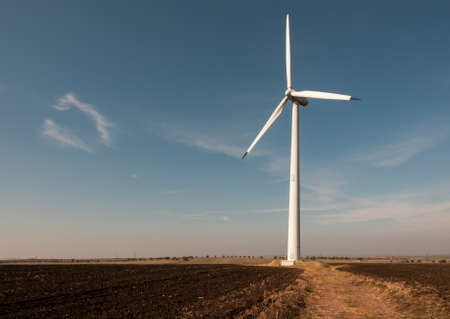 Wind generator working on the field.の写真素材