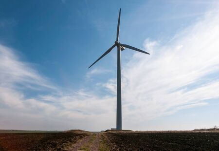 Wind generator working on the field.の写真素材