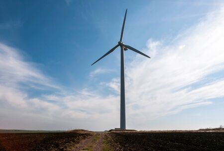 Wind generator working on the field.の写真素材
