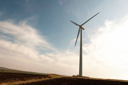 Wind generator working on the field.の写真素材