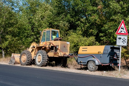 Support activities for the construction of roads and highways. Road under construction.の写真素材