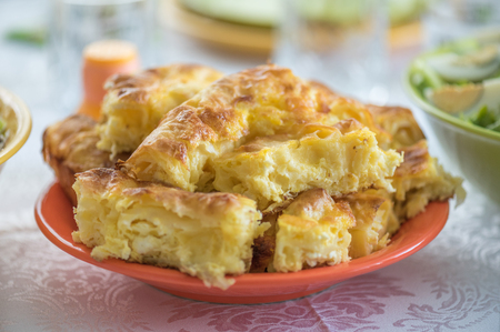 Homemade puff pastry with cheese.の写真素材