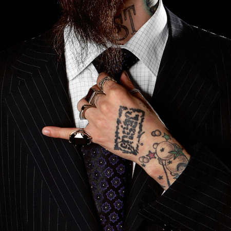 The man with a tattoo on his handの写真素材