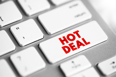Hot Deal - a special offer or promotion that is particularly attractive due to its significant discount or favorable terms, text concept button on keyboardの写真素材