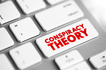 Conspiracy Theory is an explanation for an event or situation that invokes a conspiracy by sinister and powerful groups, text concept button on keyboardの写真素材