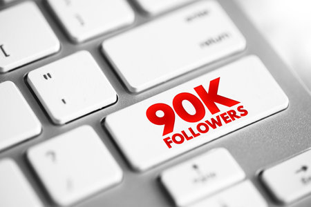 90K Followers - reaching 90,000 followers on a social media platform or other online platform, text concept button on keyboardの写真素材