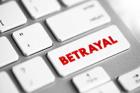 Betrayal - the action of betraying one's country or a person, treachery, text concept button on keyboardの写真素材
