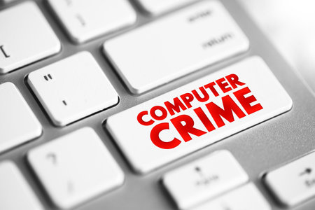 Computer Crime - the use of a computer as an instrument to further illegal ends, text concept button...