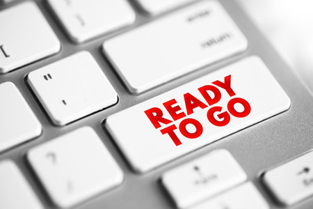 Ready to Go - prepared and in a state of readiness for immediate action or departure, text concept button on keyboardの写真素材