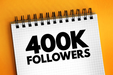400K Followers - reaching 400,000 followers on a social media platform or other online platform, text concept on notepadの写真素材