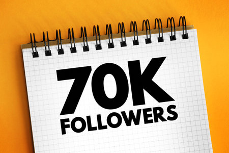 70K Followers - reaching 70,000 followers on a social media platform or other online platform, text concept on notepadの写真素材