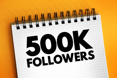 500K Followers - reaching 500,000 followers on a social media platform or other online platform, text concept on notepadの写真素材