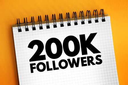 200K Followers - reaching 200,000 followers on a social media platform or other online platform, text concept on notepadの写真素材