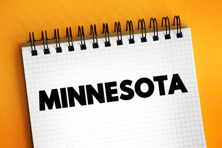 Minnesota is a state in the Upper Midwestern region of the United States, text concept on notepadの写真素材