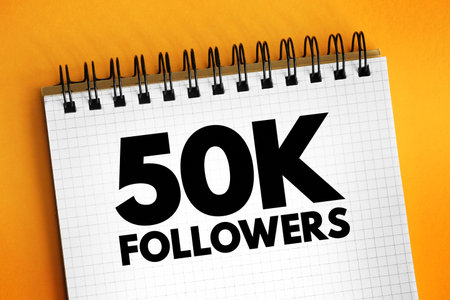 50K Followers - reaching 50,000 followers on a social media platform or other online platform, text concept on notepadの写真素材