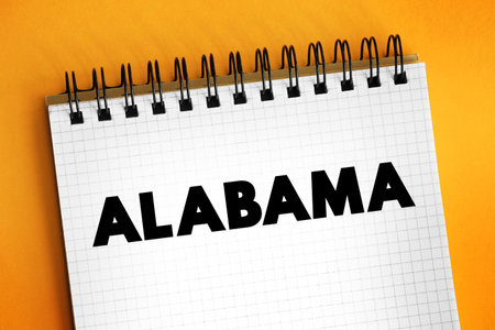 Alabama is a state in the Southeastern region of the United States, text concept on notepadの写真素材