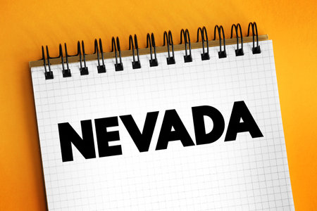 Nevada is a landlocked state in the Western region of the United States, text concept on notepadの写真素材