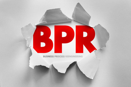 BPR (Business Process Reengineering) acronym revealed behind torn paper, representing organizational change, business transformation, workflow redesign, process innovation, and operational efficiencyの写真素材