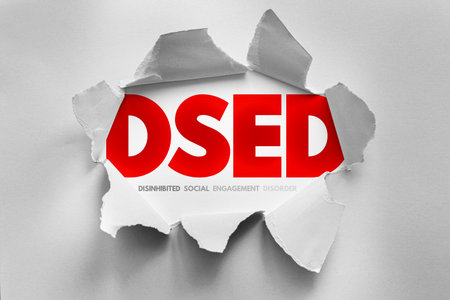 Torn paper design exposing the bold acronym DSED, representing Disinhibited Social Engagement...
