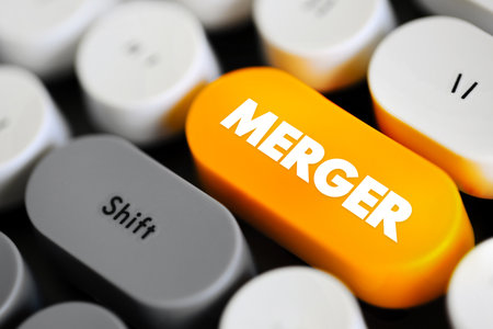Merger - takes place when two companies combine to form a new company, text concept button on...