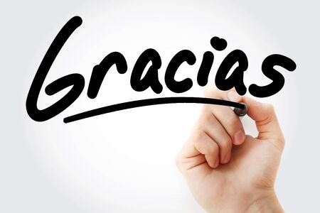 Gracias mean thank you in spanish text with marker, business conceptの写真素材