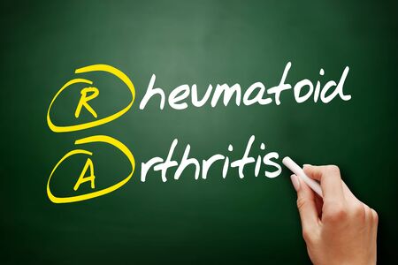 RA - Rheumatoid Arthritis acronym, concept on blackboardの写真素材