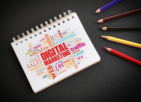Digital Marketing word cloud in notepad on desktop, business concept backgroundの写真素材