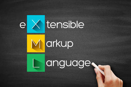 XML - eXtensible Markup Language acronym, technology concept background on blackboardの写真素材