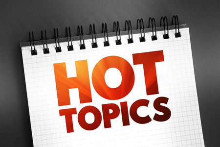 Hot Topics text on notepad, concept backgroundの写真素材