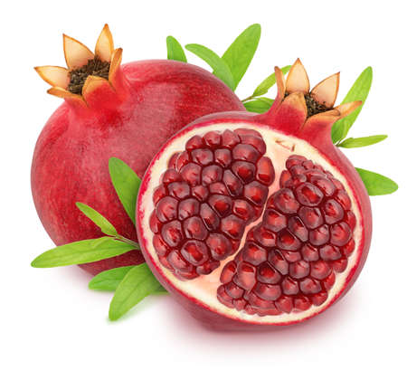 Composition with whole and cutted pomegranates with leaves isolated on white background.の写真素材
