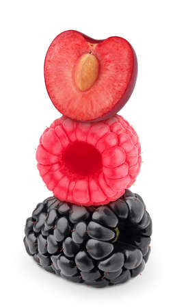 Creative composition with berries mix - raspberry , cherry and blackberry, isolated on a whiteの写真素材