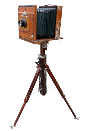 Wooden classic retro camera on tripod  の写真素材