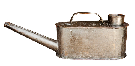 Old oil can isolated on white. Clipping path included.の写真素材