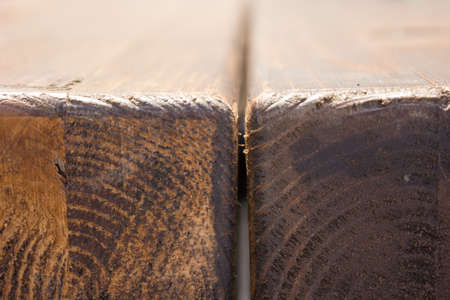 a wall of dark wood planks, photoの写真素材
