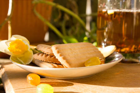 tea composition with flower and biscuits bohoの写真素材