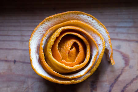 Orange peel in the form of curls or flowerの写真素材