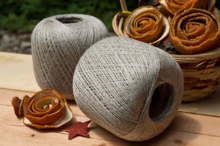 yarn for knitting in balls in the wood background
